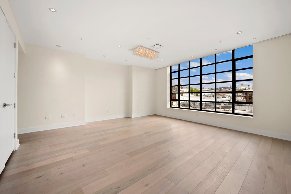 DC penthouse bedroom with rooftop city view — full media package